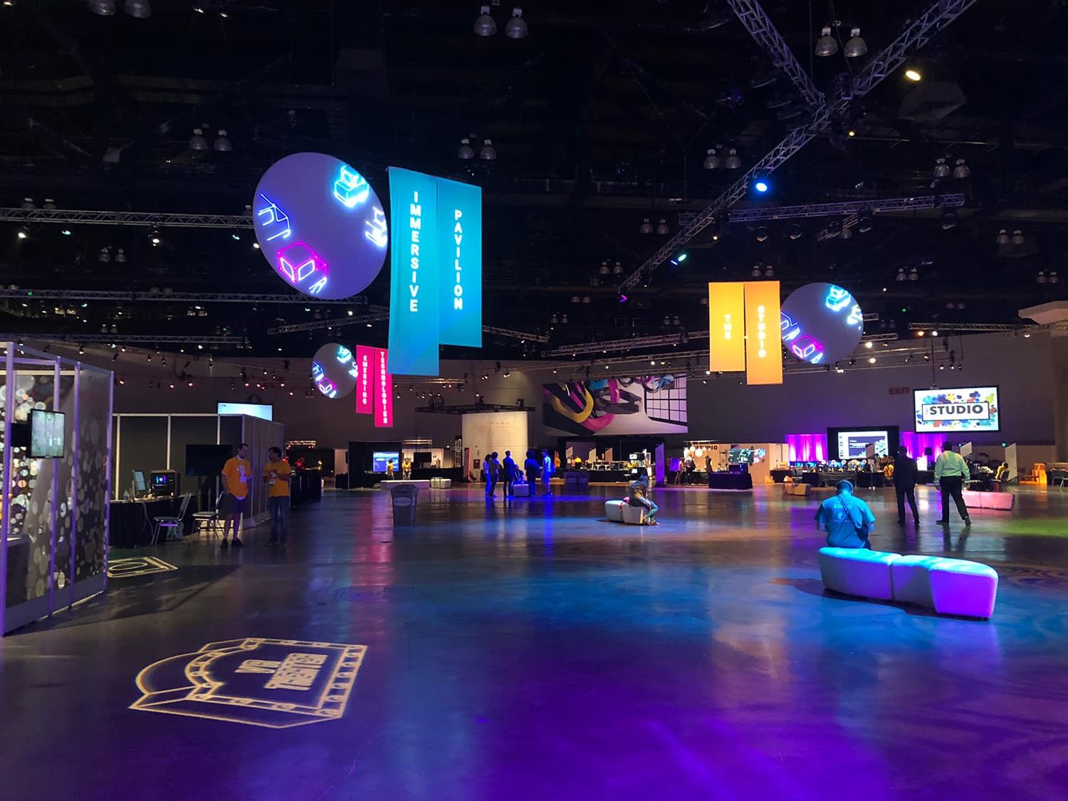The "Experience" exhibits, featuring VR, AI, and wearables.